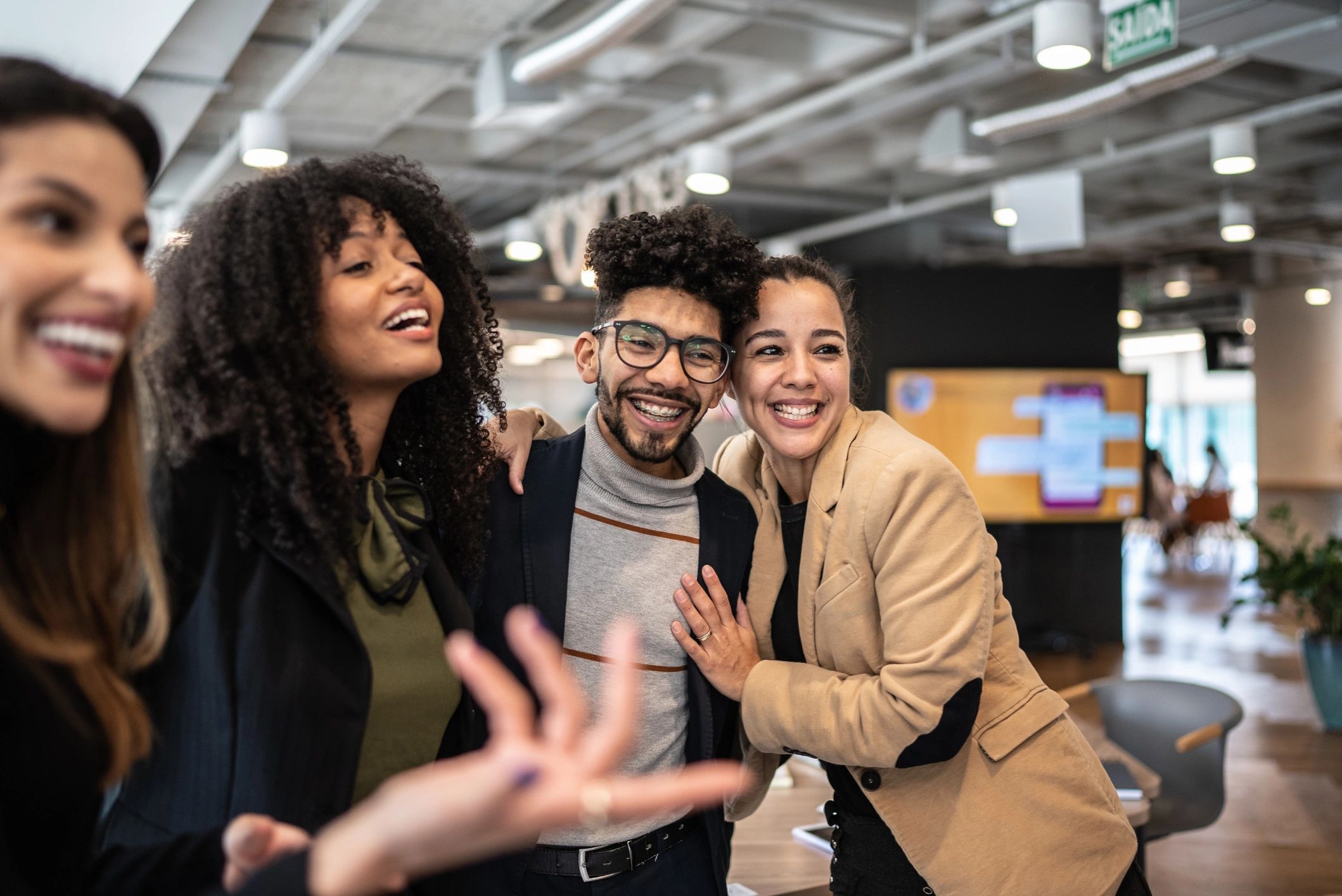 Marketing team collaborating in a modern office