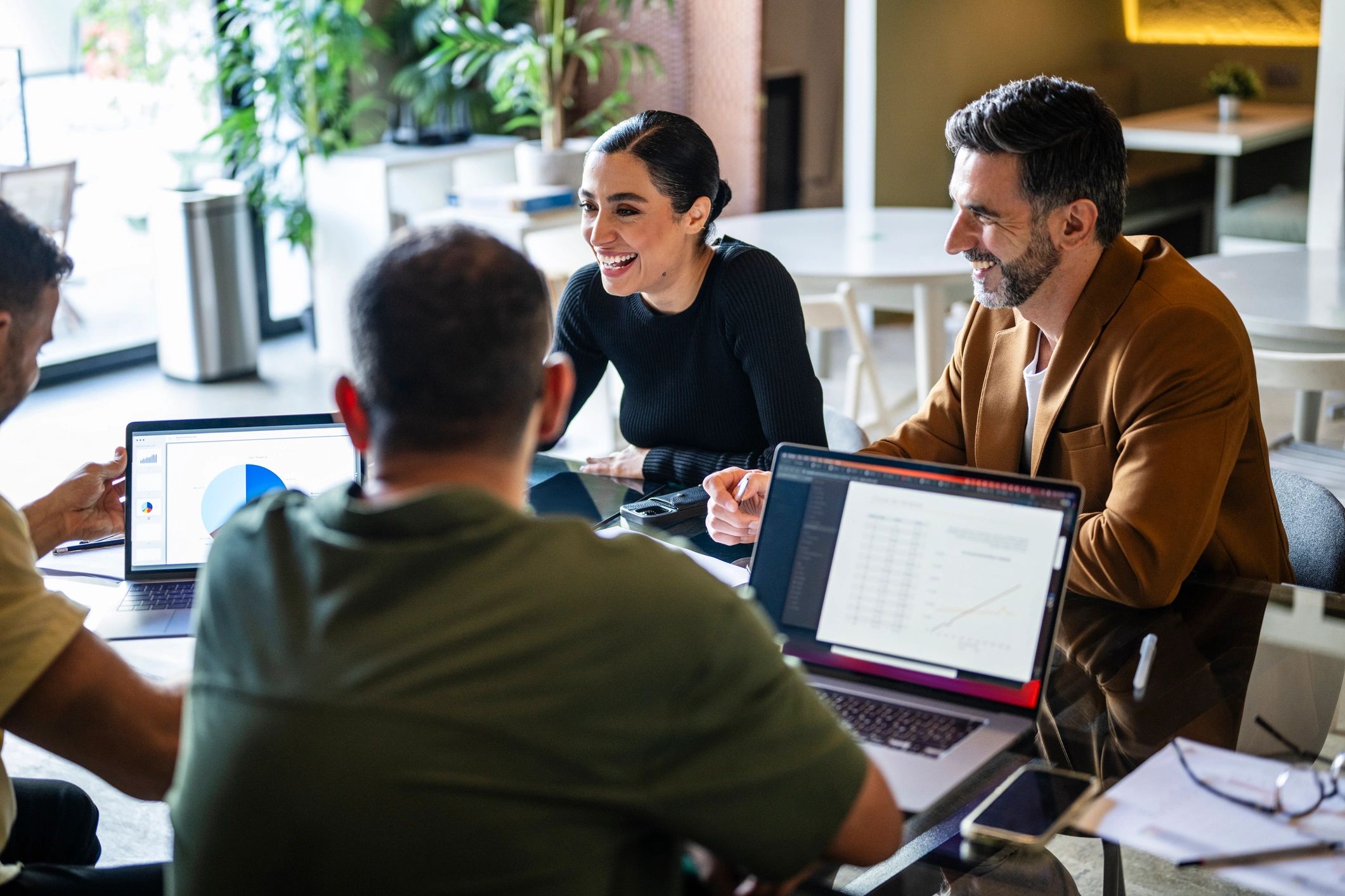 Scry Marketing team collaborating around a table